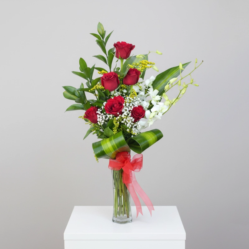 Red Roses in Glass Vase